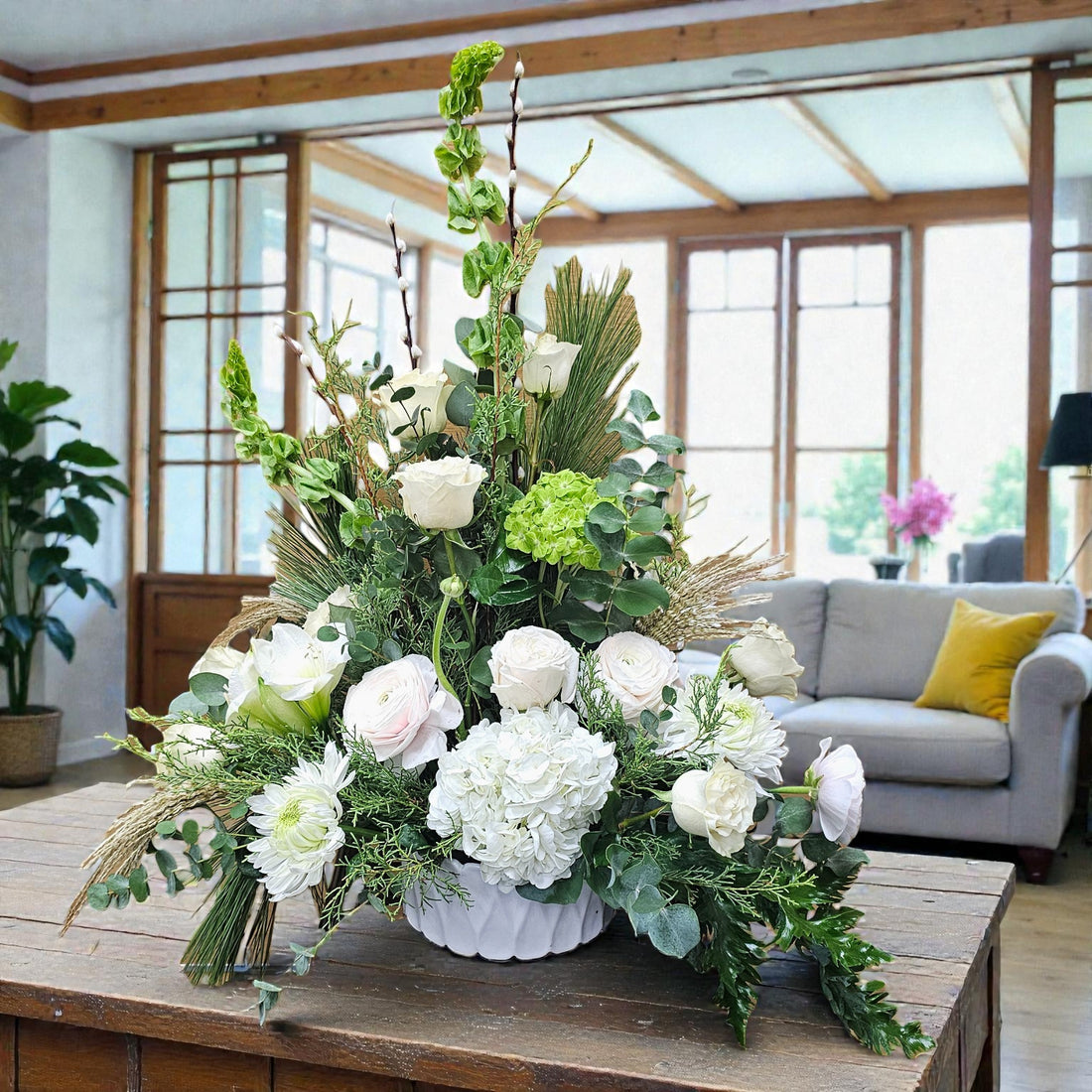 Arrangement floral blanc et verdure – Élégance naturelle et apaisante